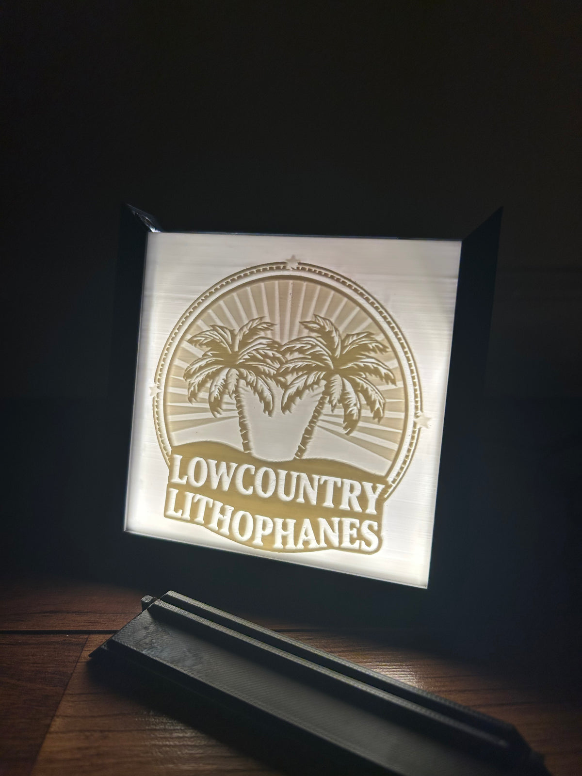 Lithophane picture frame with the Lowcountry Lithophanes logo and its removable stand