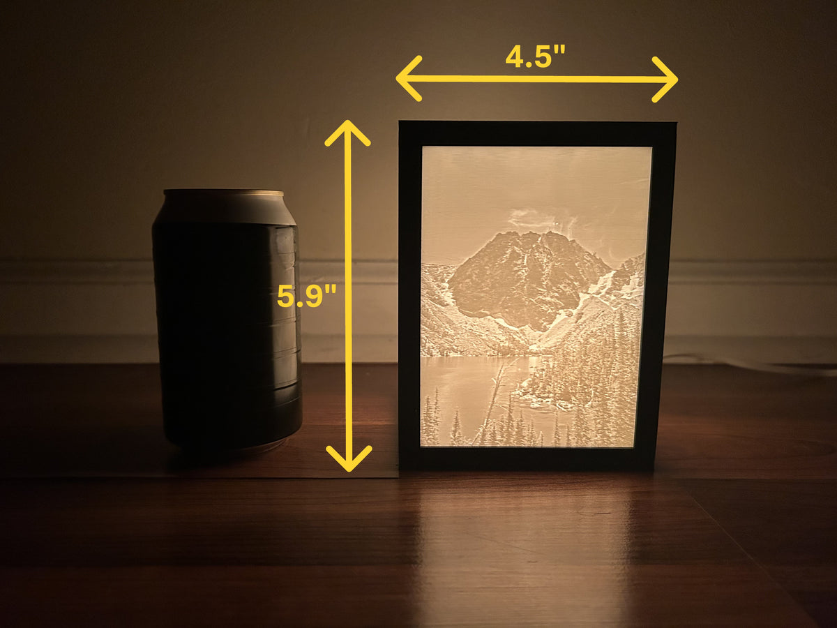 Medium lithophane box dimensions, 4.5 by 5.9 inches, next to a soda can for scale